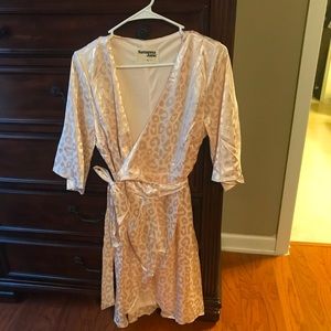 A brand new leopard champagne white wrap dress
